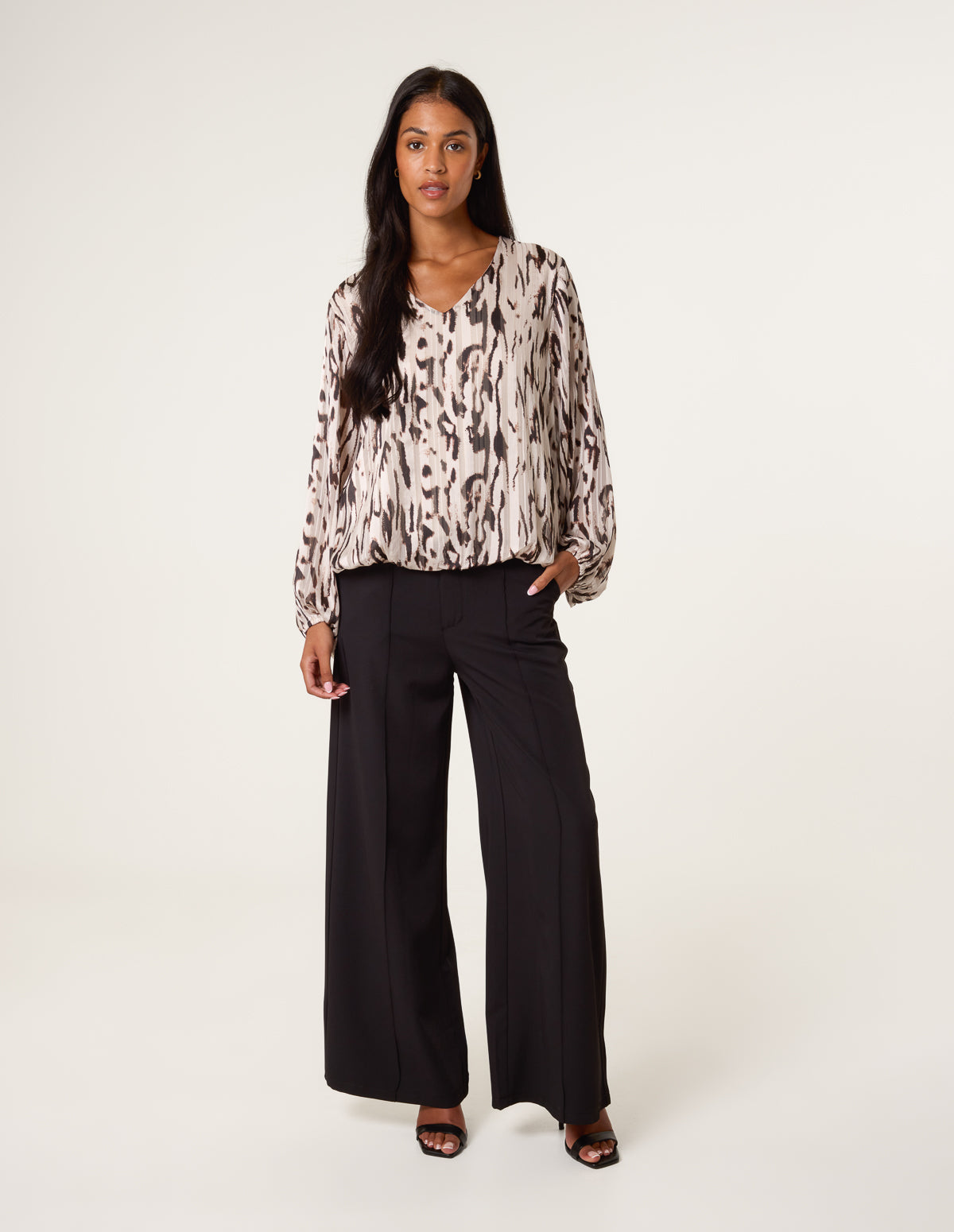 Animal Print Puffball V Neck Top