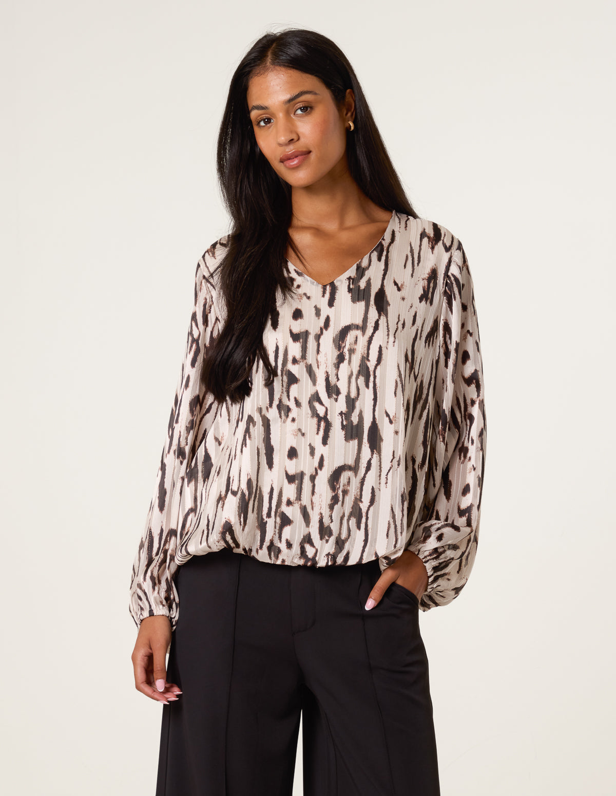 Animal Print Puffball V Neck Top