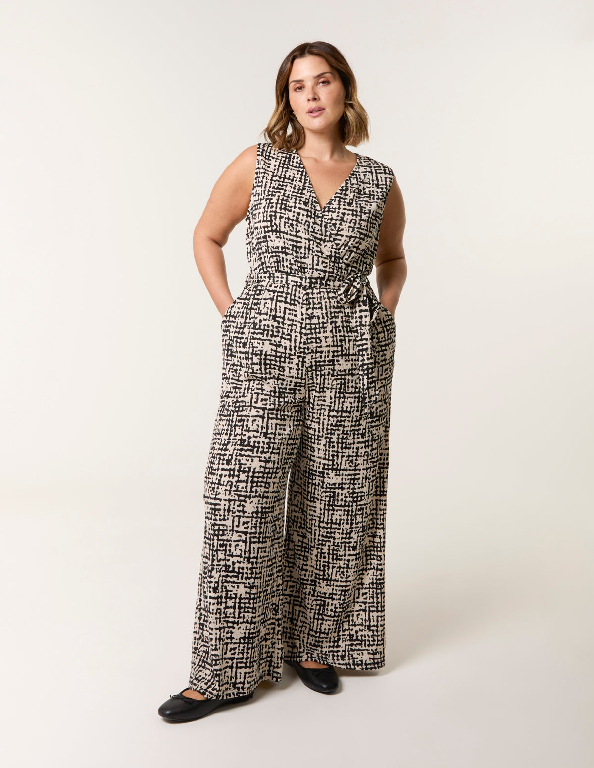 Curve Sleeveless Belted Jumpsuit